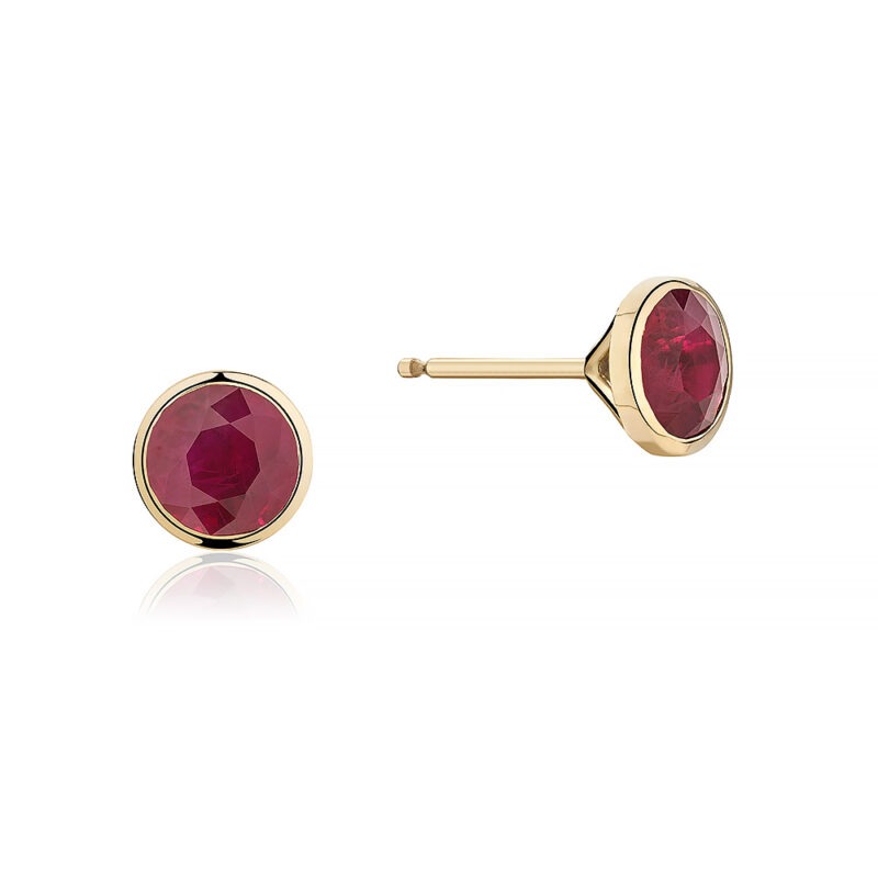 18k gold and ruby bezel set stud earrings