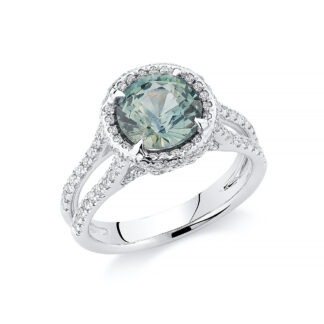 18k white gold with an unheated green sapphire and diamond ring