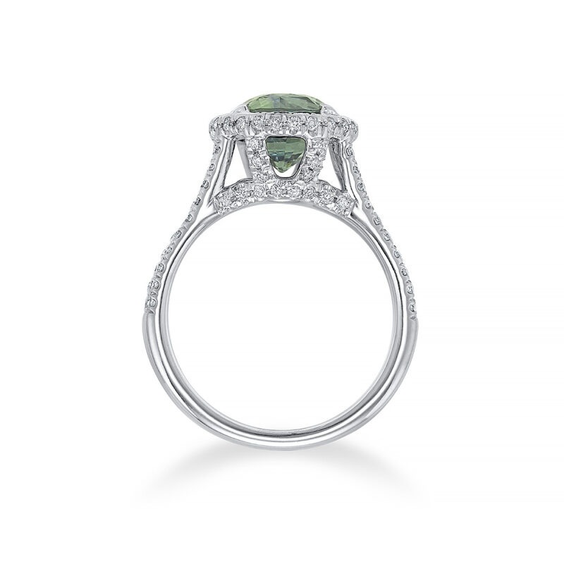 18k white gold with an unheated green sapphire and diamond ring