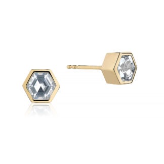18k gold bezel set hexagon studs set with unheated, natural blue sapphires